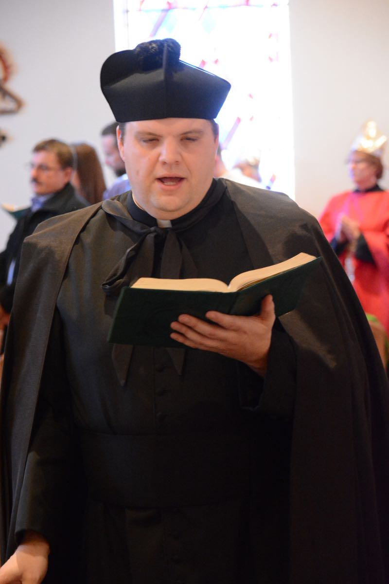 This is the only time I ever saw Father Mark wearing a biretta. (Credit: Dennis E. Powell)