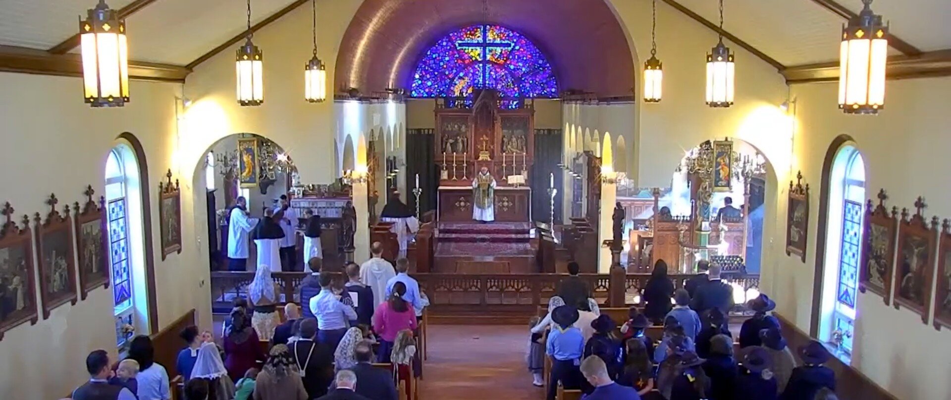 Look at all the children! This week the camera was zoomed back and those of us worshiping online could see our fellow traditional Catholics, which added a new and welcome dimension. The cloud that looks like incense is in fact incense, from the thurible.